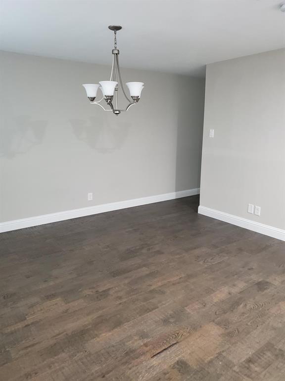 518 Burnwood Drive Irving, TX 75062 - Photo 5 of 18 a view of a room with an empty space