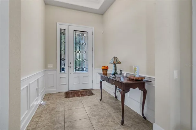 a view of a hallway with seating area
