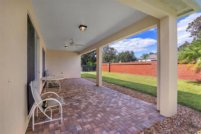 a house view with a backyard space