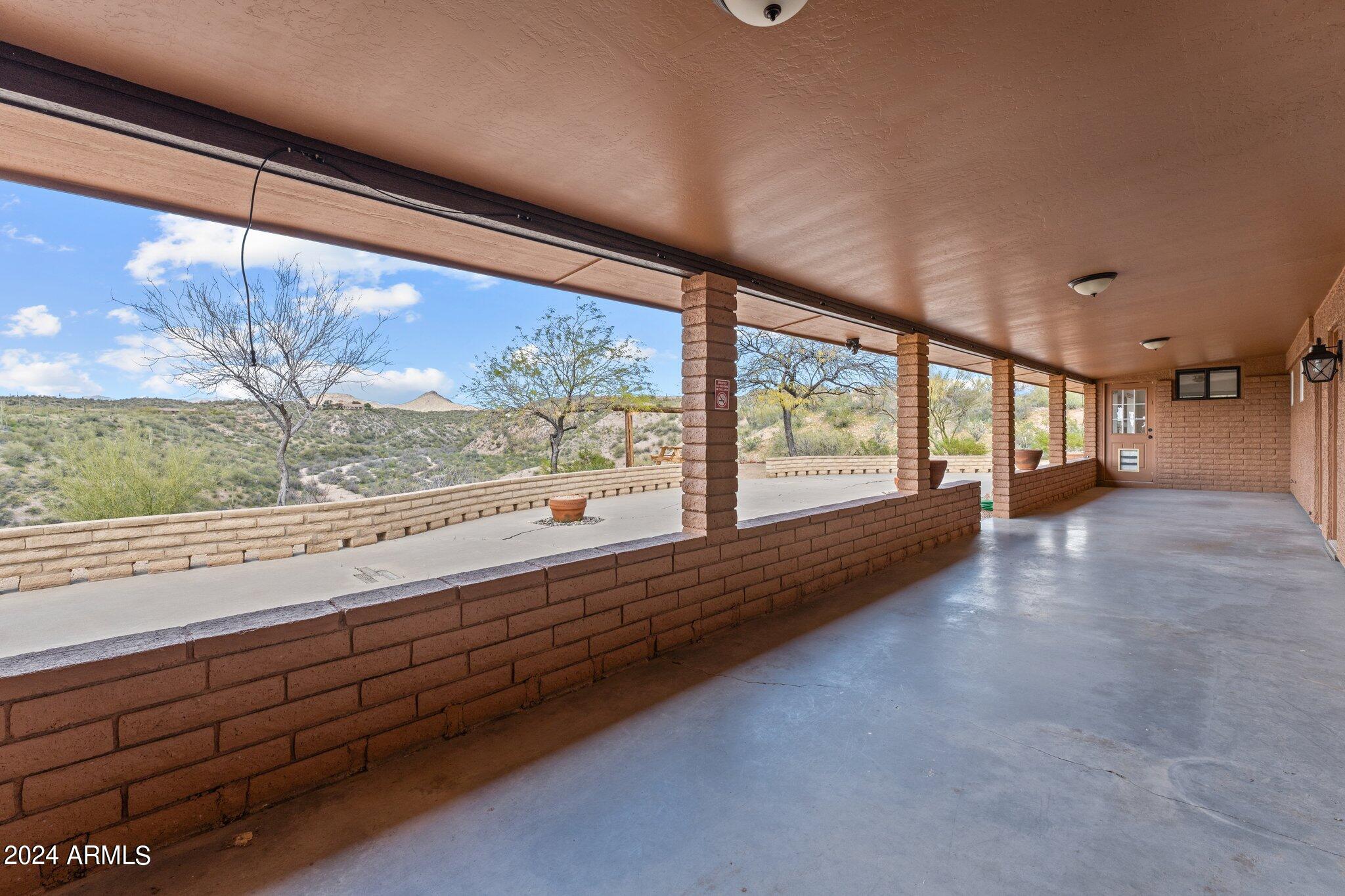1605 North Little Stonehedge Ranch Road Wickenburg, AZ 85390 - Photo 38 of 54 a view of a large and an empty room