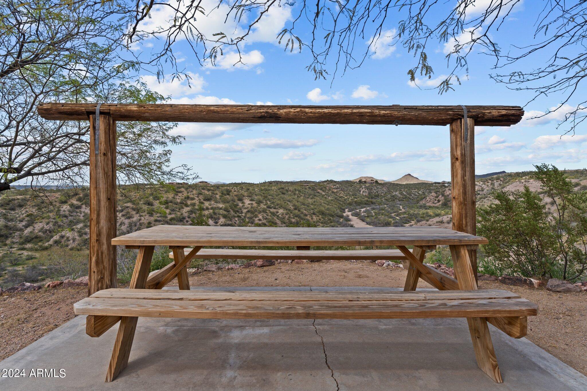 1605 North Little Stonehedge Ranch Road Wickenburg, AZ 85390 - Photo 41 of 54 a view of a bench in a balcony