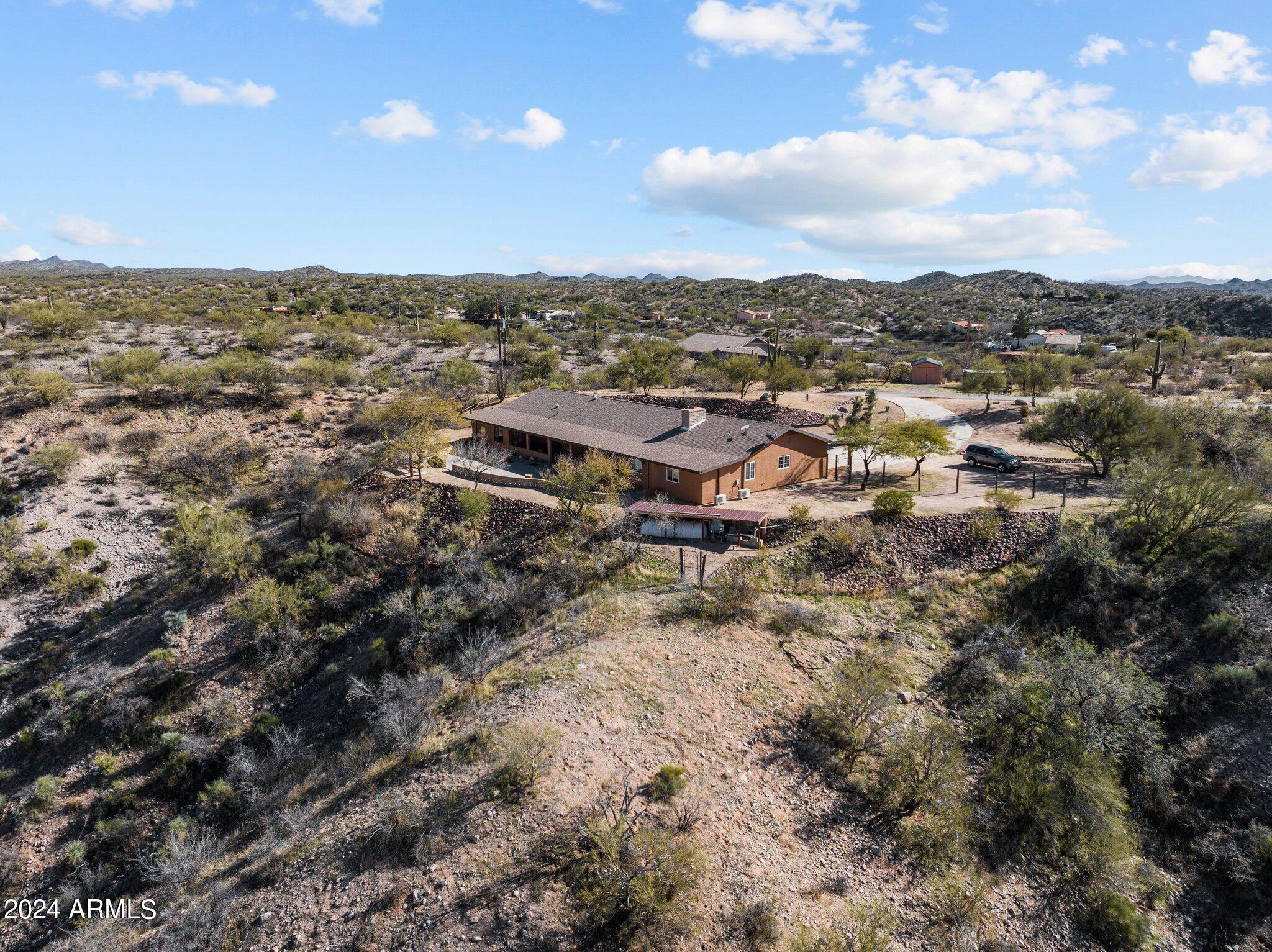 1605 North Little Stonehedge Ranch Road Wickenburg, AZ 85390 - Photo 48 of 54 an aerial view of residential house with outdoor space and trees all around