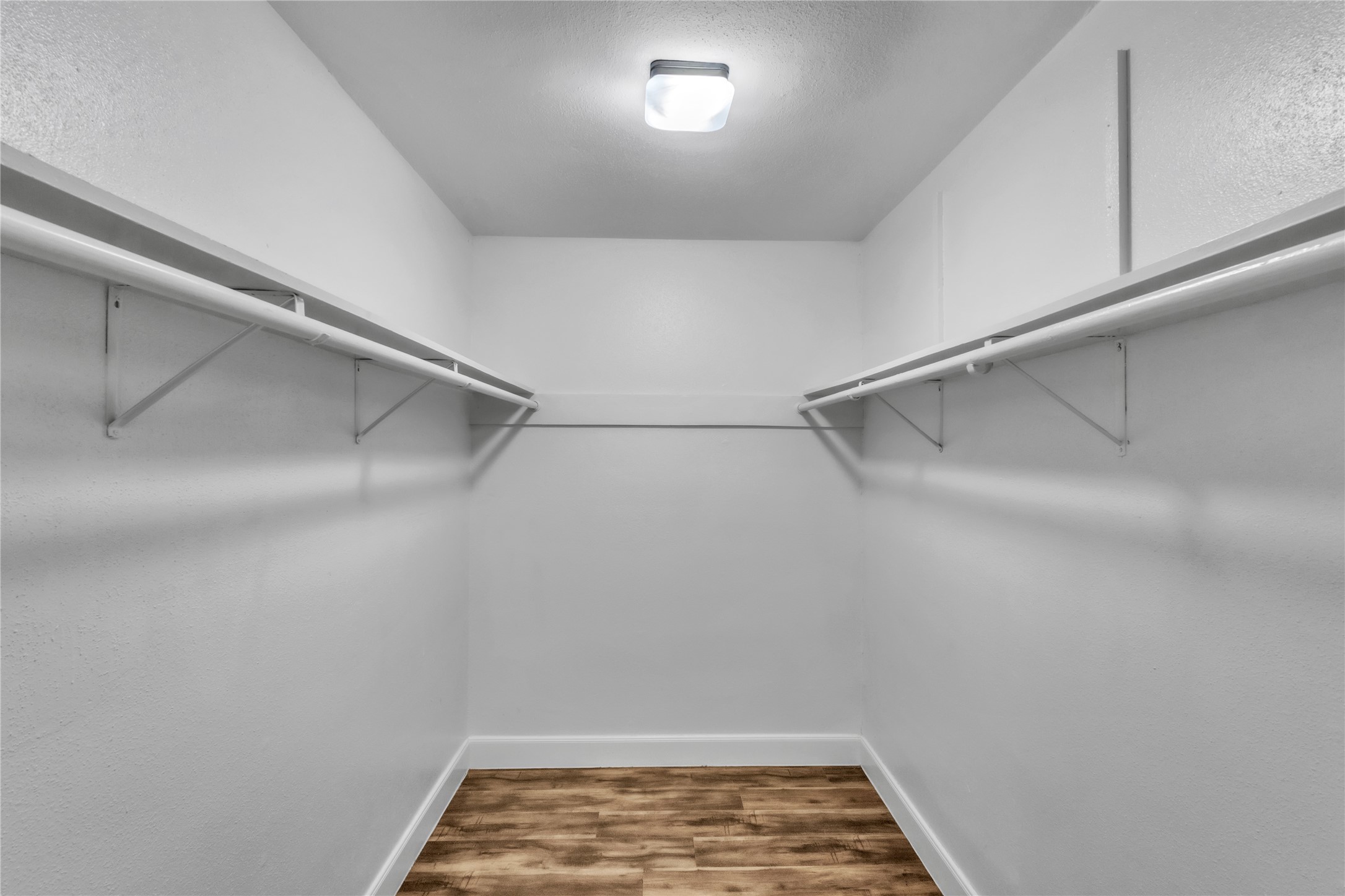 7044 South Dairy Ashford Road Houston, TX 77072 - Photo 23 of 30 a view of a room with racks on the wall