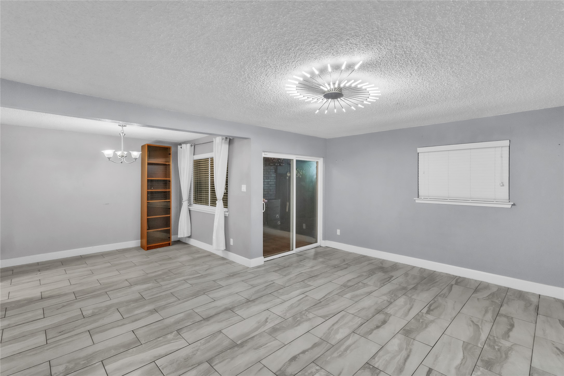 7044 South Dairy Ashford Road Houston, TX 77072 - Photo 10 of 30 a view of an empty room with a window