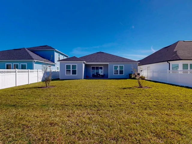 a view of a lake with furniture