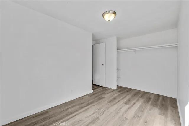 a view of kitchen with wooden floor