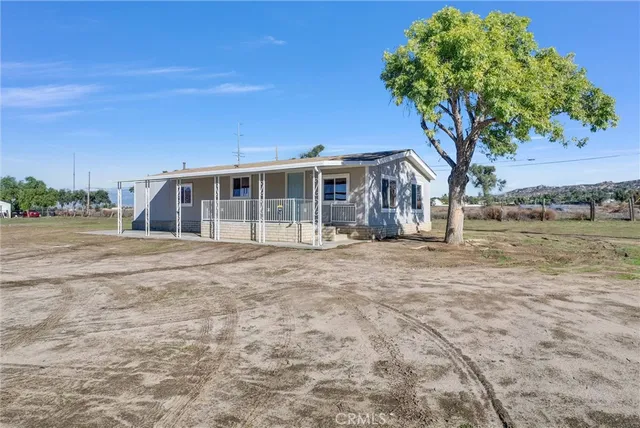 a house with trees in front of it