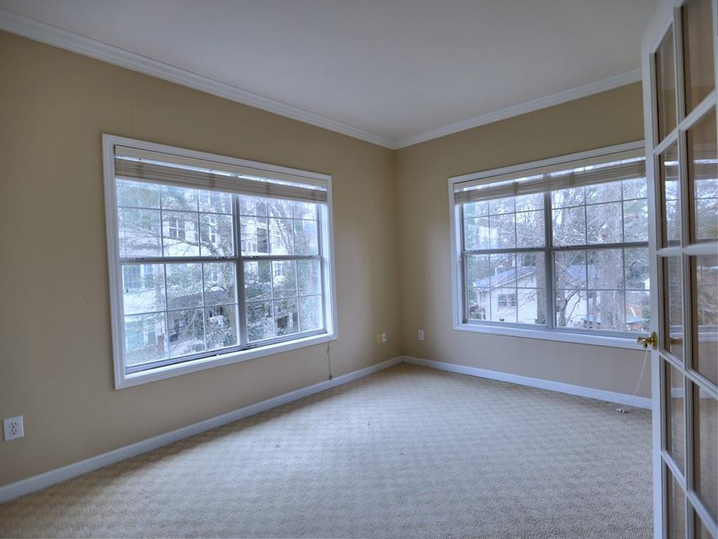 3636 Habersham Road Northwest, Unit 2308 Atlanta, GA 30305 - Photo 21 of 42 a view of an empty room with a window