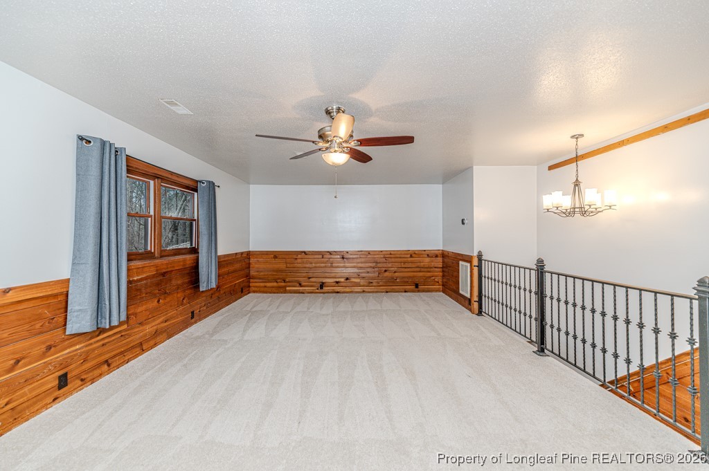 515 Tramway West Road Sanford, NC 27330 - Photo 24 of 38 a view of room with ceiling fan and window