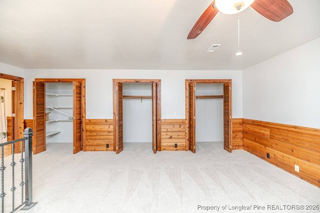 515 Tramway West Road Sanford, NC 27330 - Photo 26 of 38 an empty room with closet and windows
