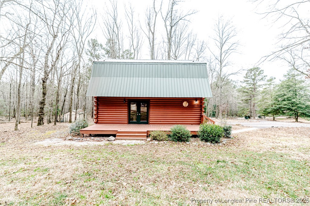 515 Tramway West Road Sanford, NC 27330 - Photo 34 of 38 a front view of a house with a yard and garage