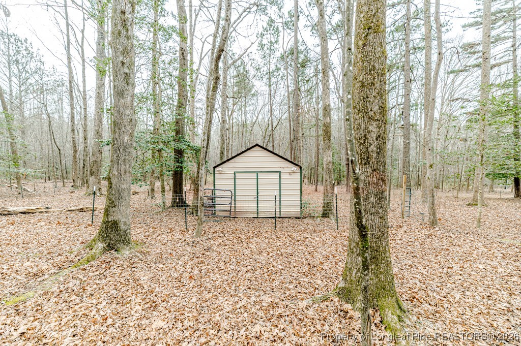 515 Tramway West Road Sanford, NC 27330 - Photo 35 of 38 a view of a backyard