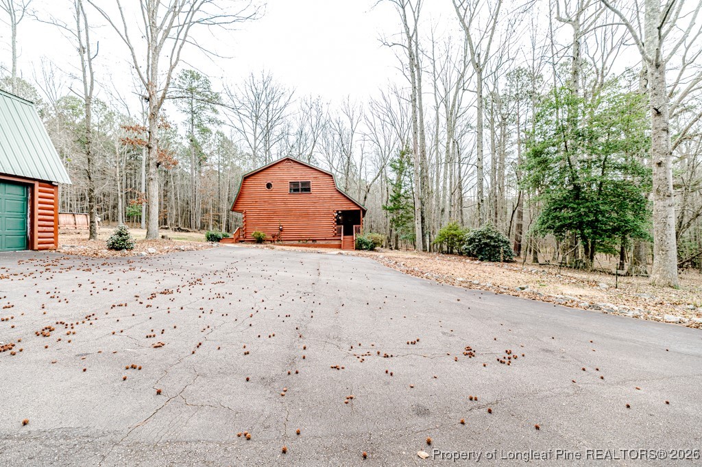 515 Tramway West Road Sanford, NC 27330 - Photo 4 of 38 front view of a house with a yard