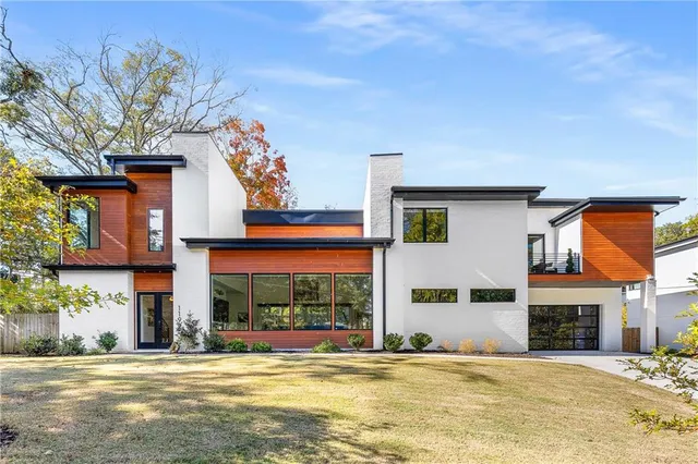 a view of a house with a swimming pool and a fireplace