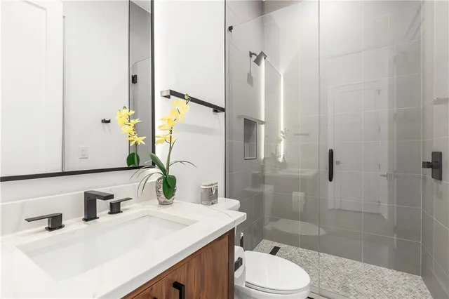 a view of storage and utility room with washer and dryer