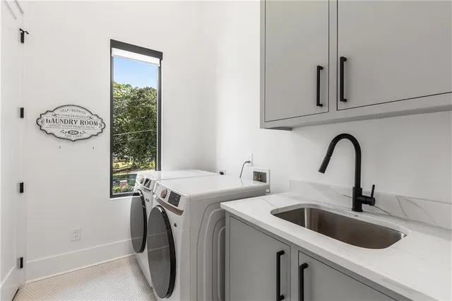 a spacious bedroom with a balcony a bed and a large window
