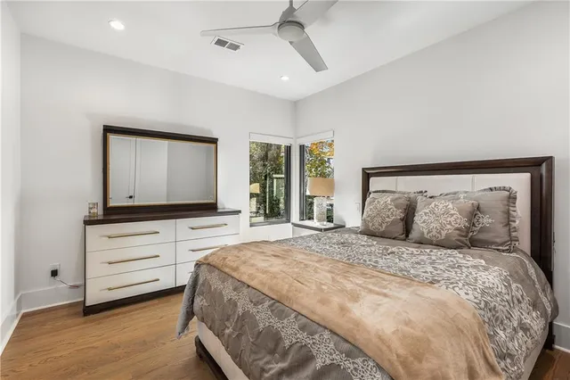 a bedroom with a bed and a walk in closet