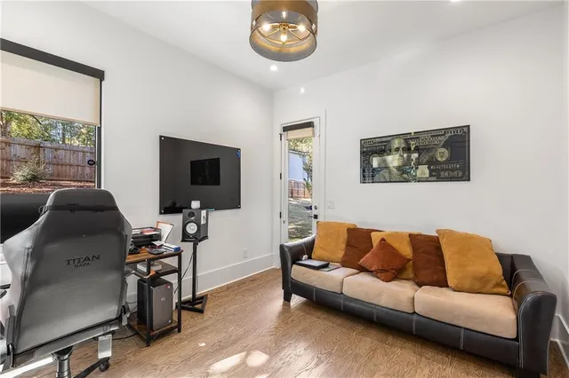 a room with gym equipment and a large window