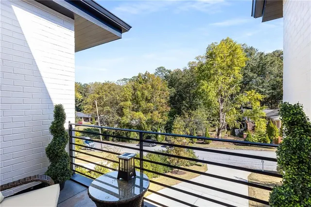 a living room with couch and a table
