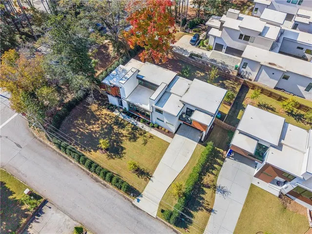 an aerial view of a city with lots of residential buildings