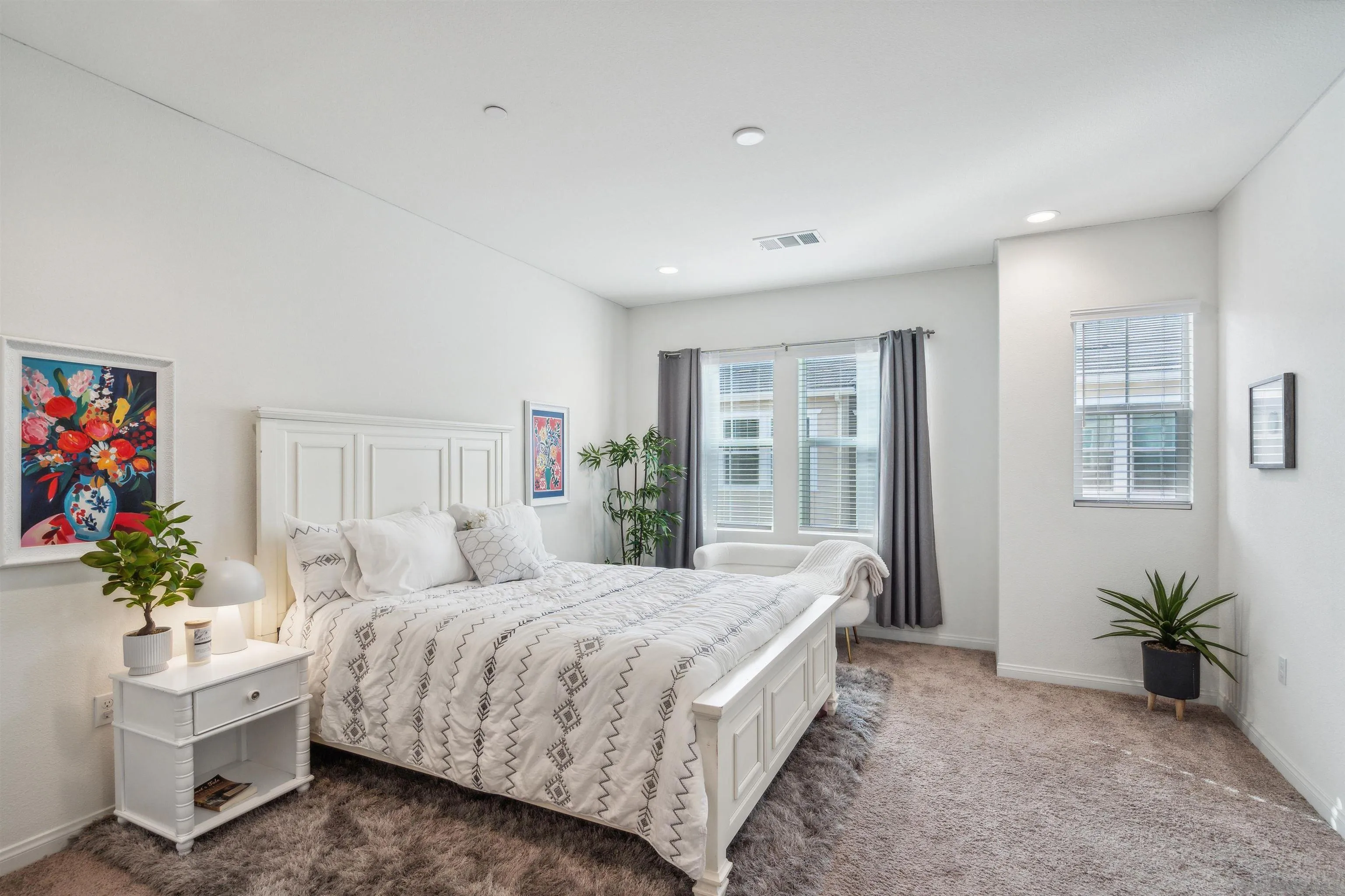 2018 Barite Street Spring Valley, CA 91977 - Photo 34 of 47 a bedroom with a bed furniture and a potted plant