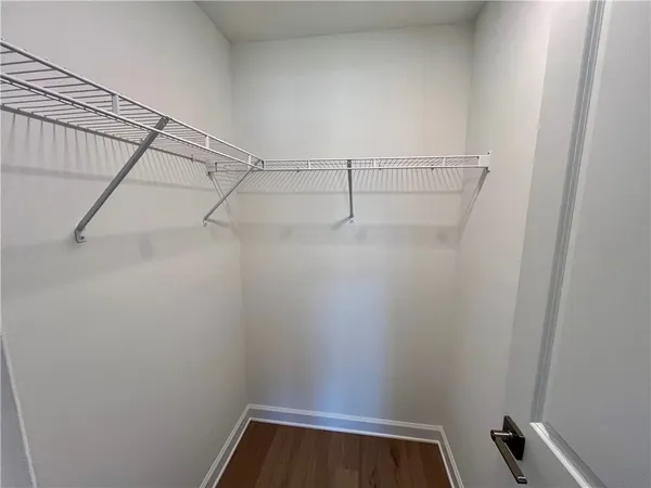 a view of a room with racks on the wall