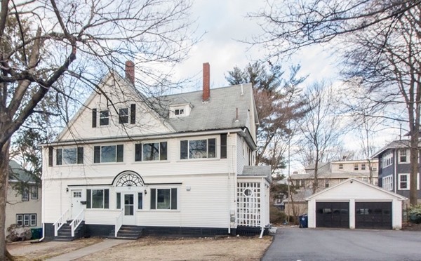 8-10 Allston Street Newton, MA 02465 - Photo 2 of 42 a front view of a building with lot of trees