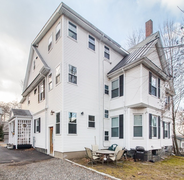 8-10 Allston Street Newton, MA 02465 - Photo 5 of 42 a front view of a house with windows