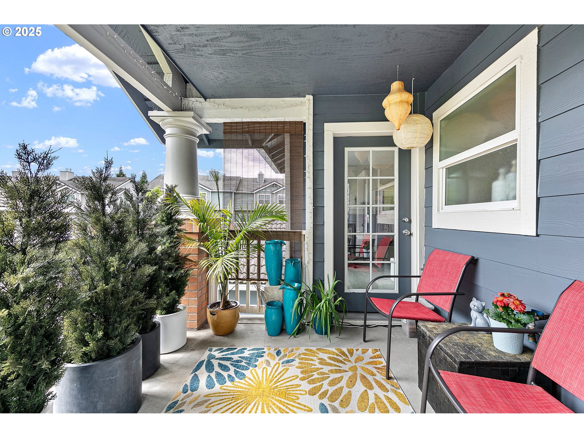 30366 Southwest Ruth Street, Unit 70 Wilsonville, OR 97070 - Photo 23 of 46 a view of a chairs and table in a patio