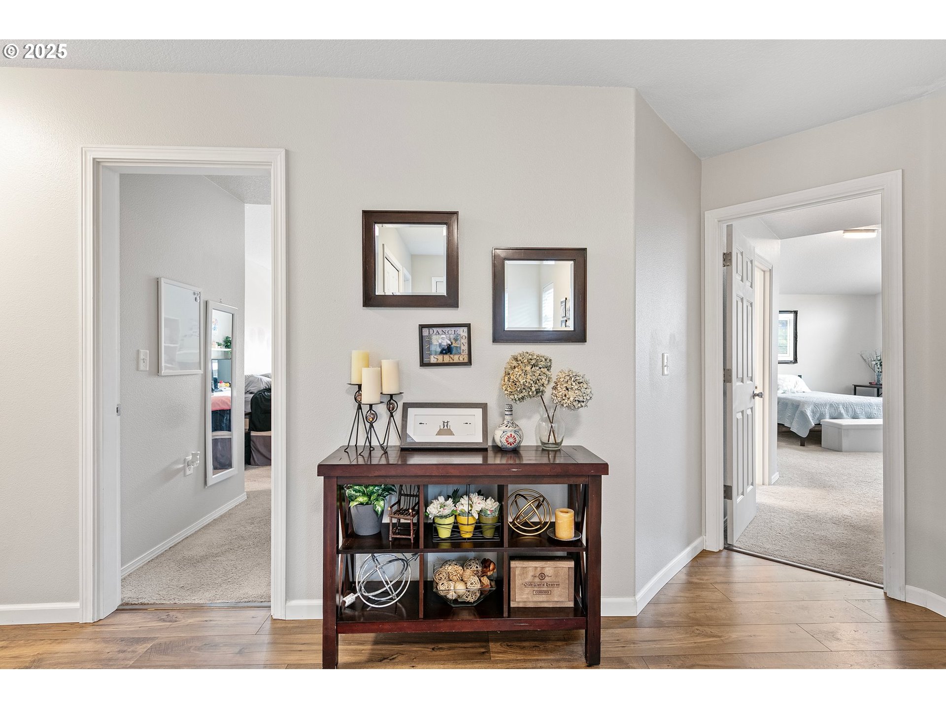 30366 Southwest Ruth Street, Unit 70 Wilsonville, OR 97070 - Photo 6 of 46 a living room with furniture and a wooden floor