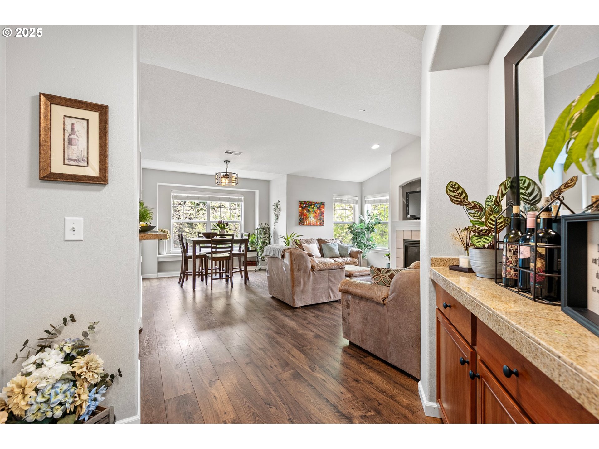 30366 Southwest Ruth Street, Unit 70 Wilsonville, OR 97070 - Photo 8 of 46 a living room with furniture and wooden floor