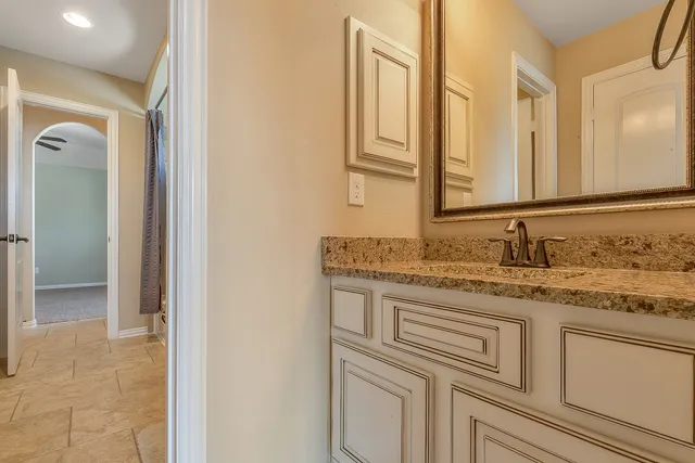 a view of an empty room with a bathroom