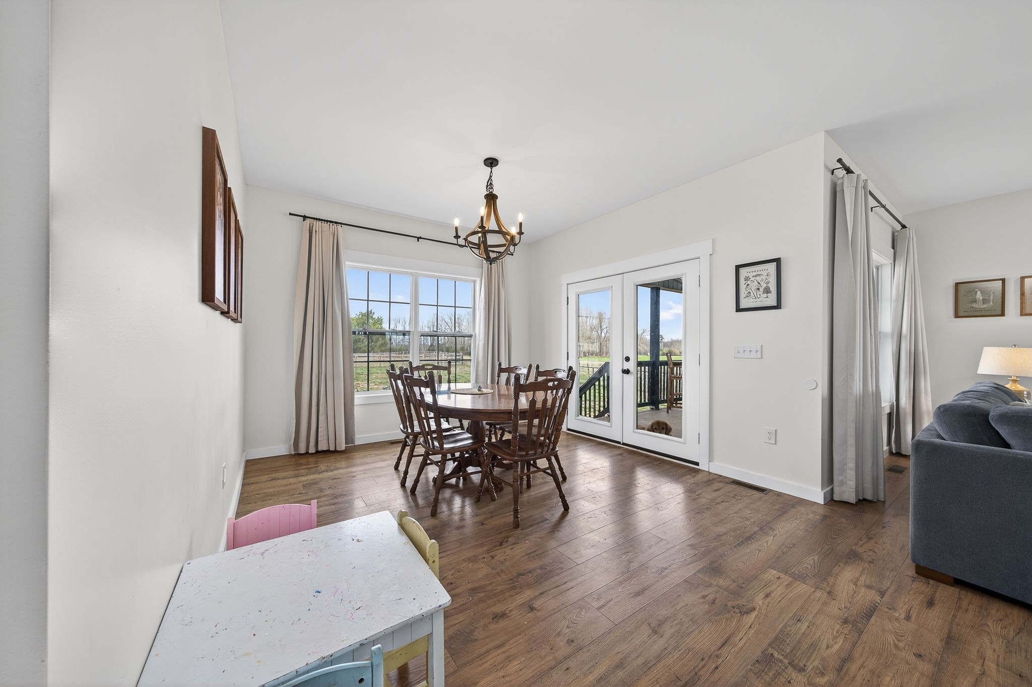 652 Clog Valley Road Sparta, TN 38583 - Photo 11 of 38 a view of a dining room with furniture window and wooden floor
