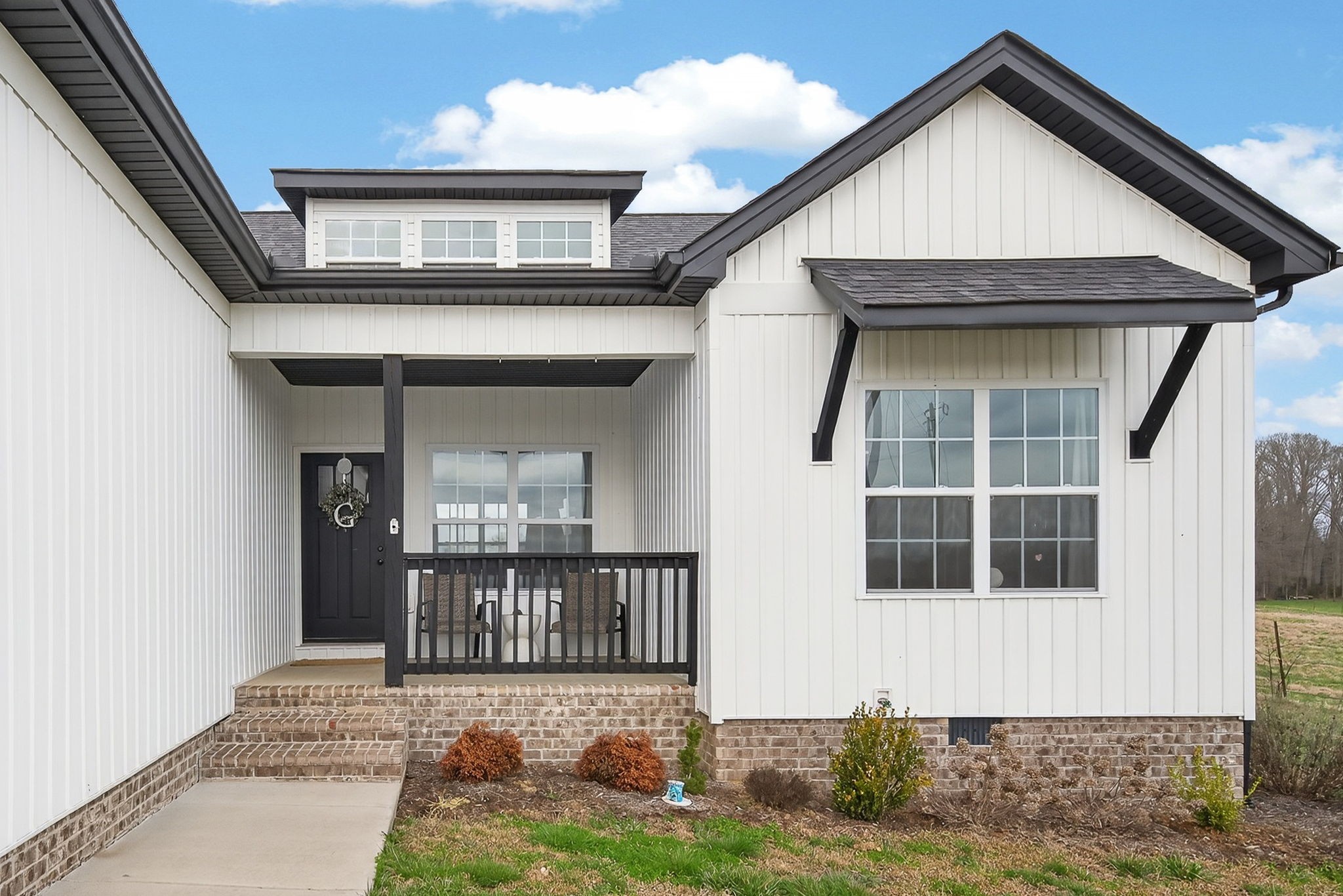 652 Clog Valley Road Sparta, TN 38583 - Photo 24 of 38 a front view of a house with a yard