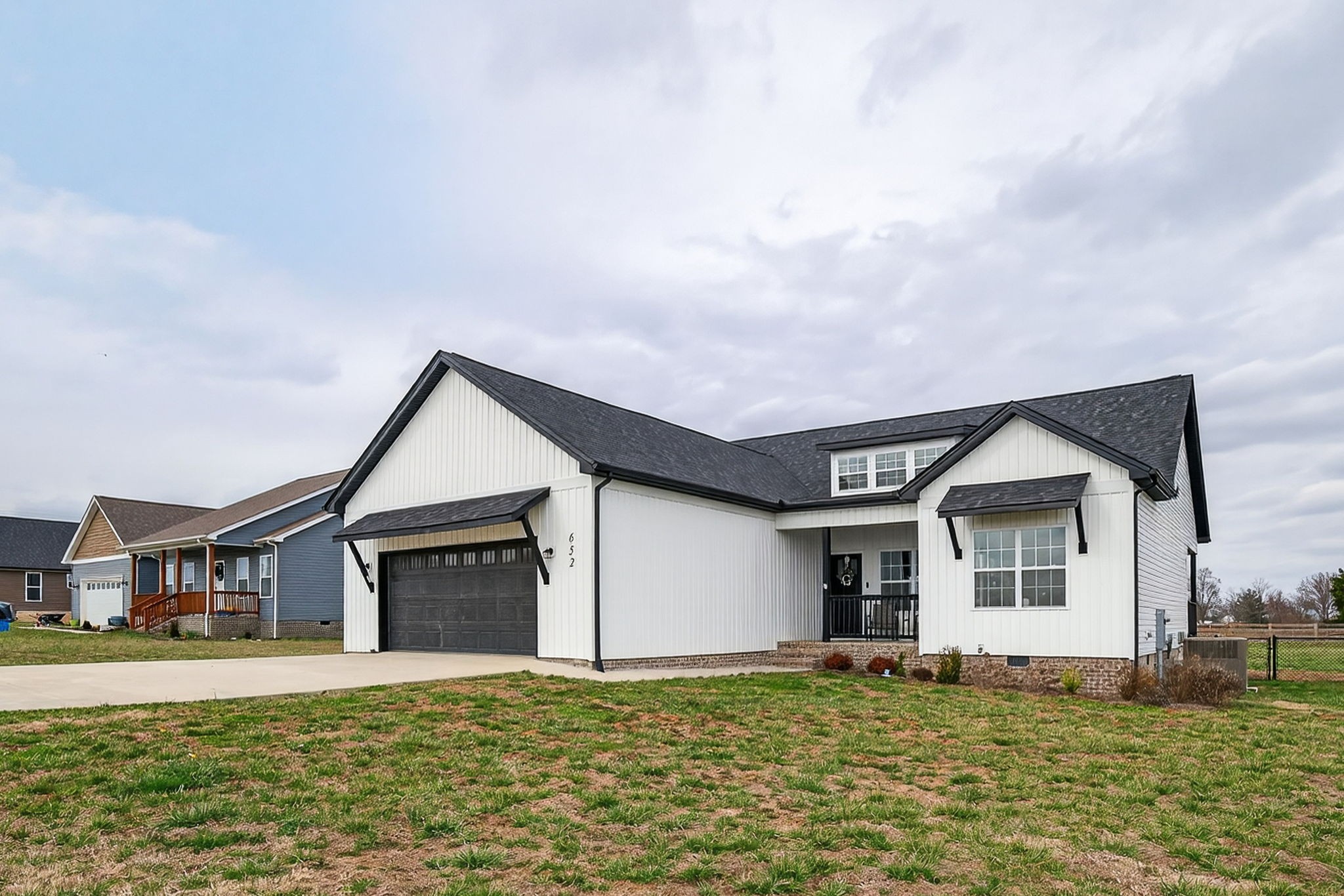 652 Clog Valley Road Sparta, TN 38583 - Photo 26 of 38 a front view of a house with a yard