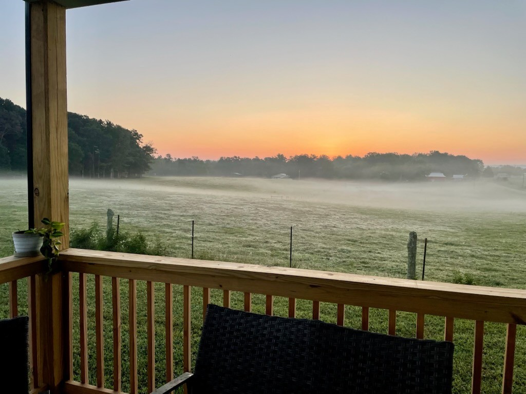 652 Clog Valley Road Sparta, TN 38583 - Photo 3 of 38 a view of a lake from a balcony