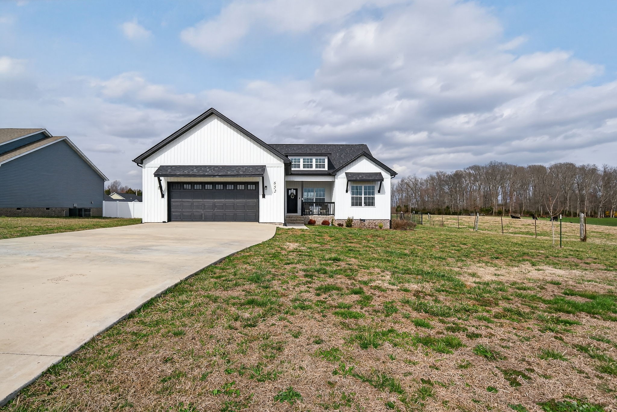 652 Clog Valley Road Sparta, TN 38583 - Photo 34 of 38 a view of a house with a yard