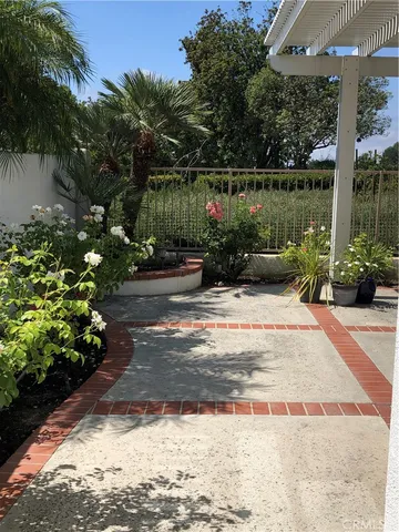 a view of a house with entrance gate