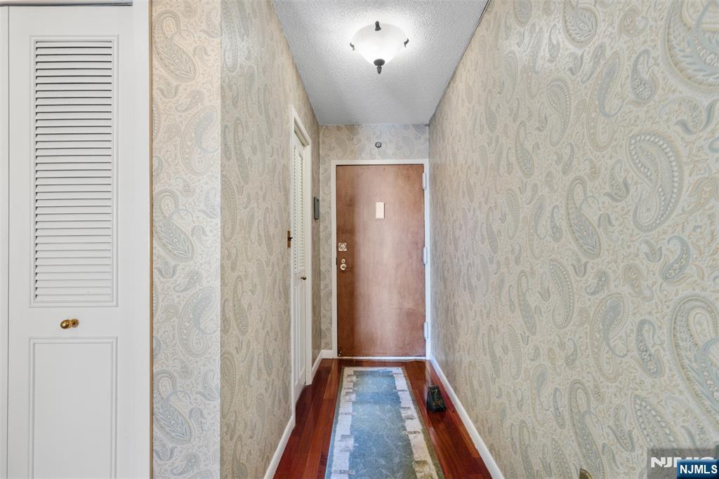 151 Prospect Avenue, Unit 9D Hackensack, NJ 07601 - Photo 29 of 38 a view of a hallway