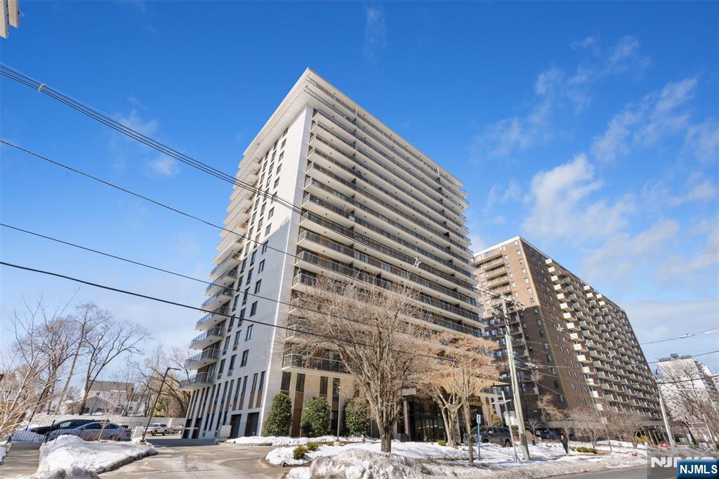 151 Prospect Avenue, Unit 9D Hackensack, NJ 07601 - Photo 36 of 38 a view of a tall building