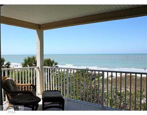 102 Gulf Boulevard, Unit 301 Indian Rocks Beach, FL 33785 - Photo 1 of 1 a balcony with wooden floor