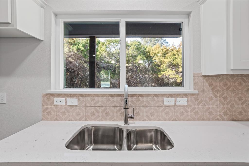 9320 Apache Trail Rio Vista, TX 76093 - Photo 20 of 33 a view of a sink and a window
