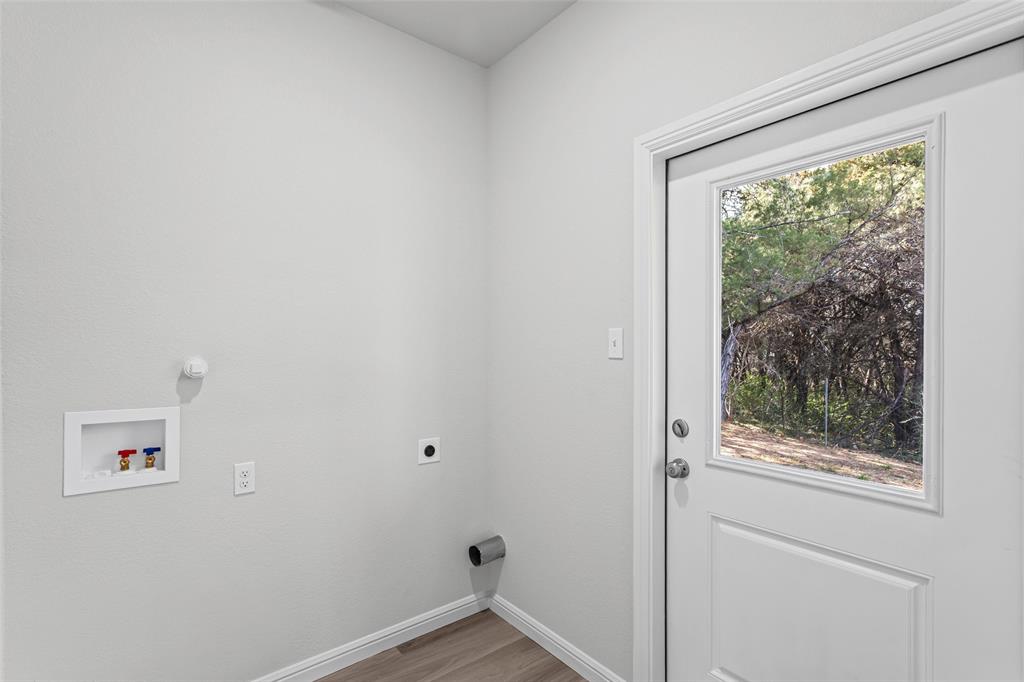 9320 Apache Trail Rio Vista, TX 76093 - Photo 22 of 33 a view of an empty room with a window