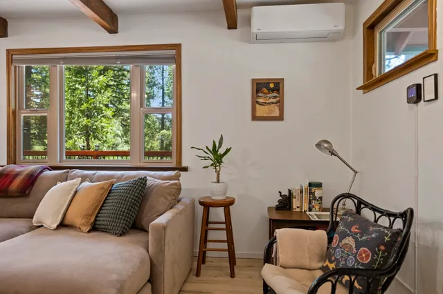 a view of a chairs on wooden deck