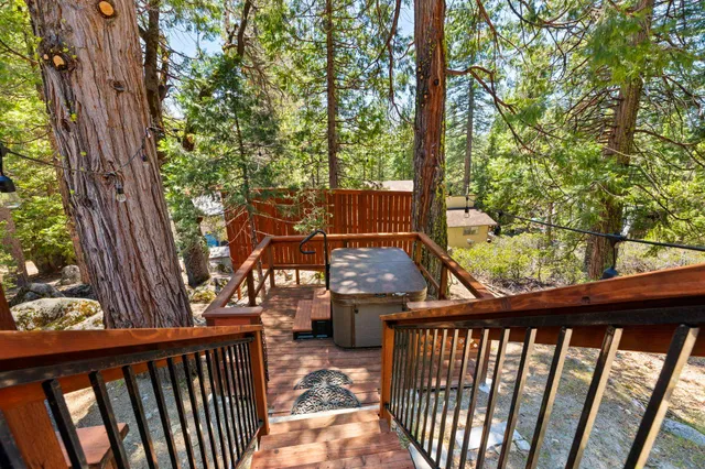 a view of a two chairs in the balcony