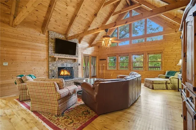 a living room with a flat screen tv and a table