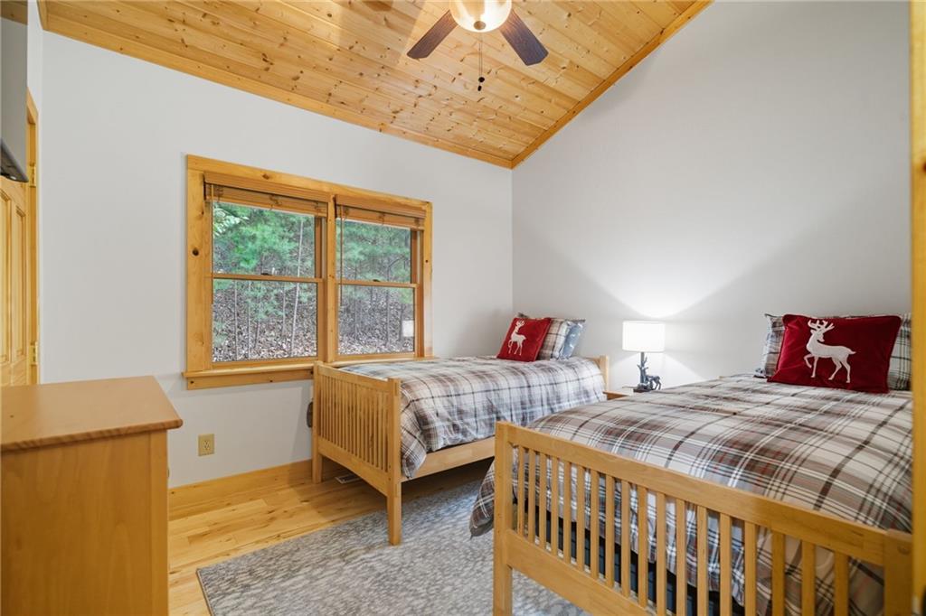 469 Moss Patch Trail Jasper, GA 30143 - Photo 24 of 49 a bedroom with two beds and window