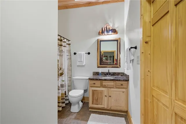 a view of a two chairs in the balcony