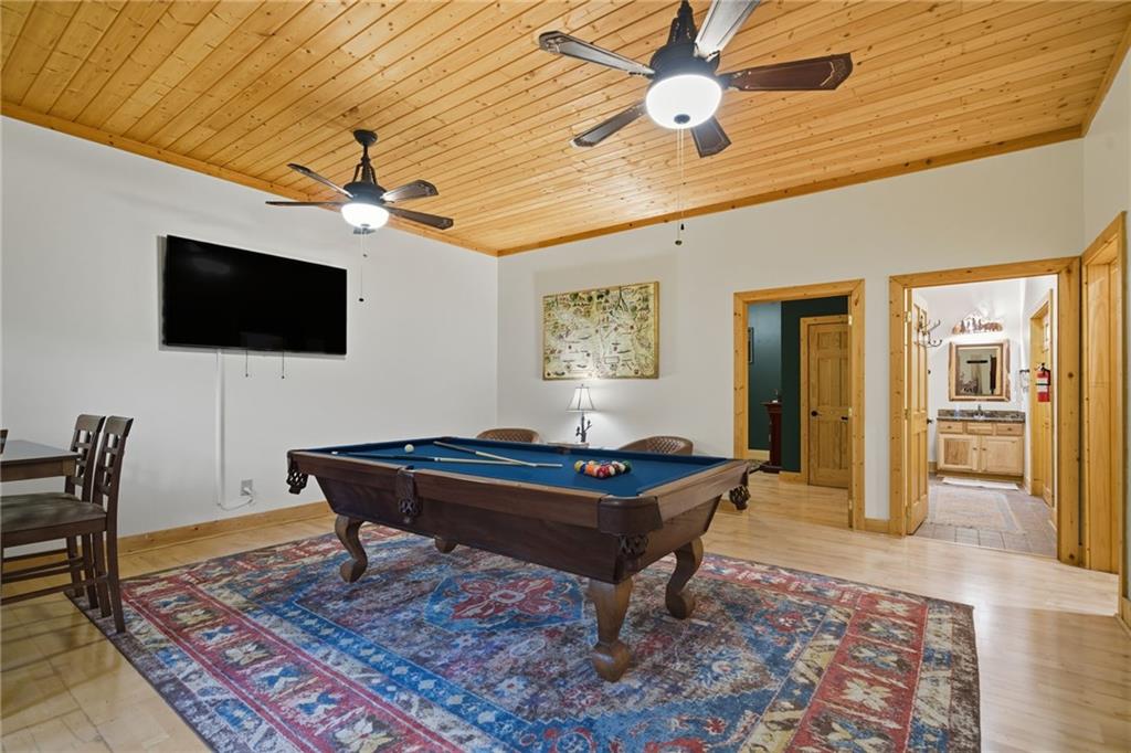 469 Moss Patch Trail Jasper, GA 30143 - Photo 3 of 49 a living room with a flat screen tv and a table