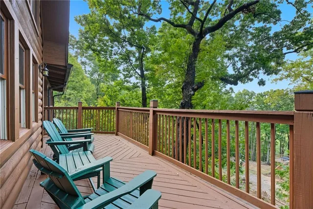 a view of a two chairs in the deck
